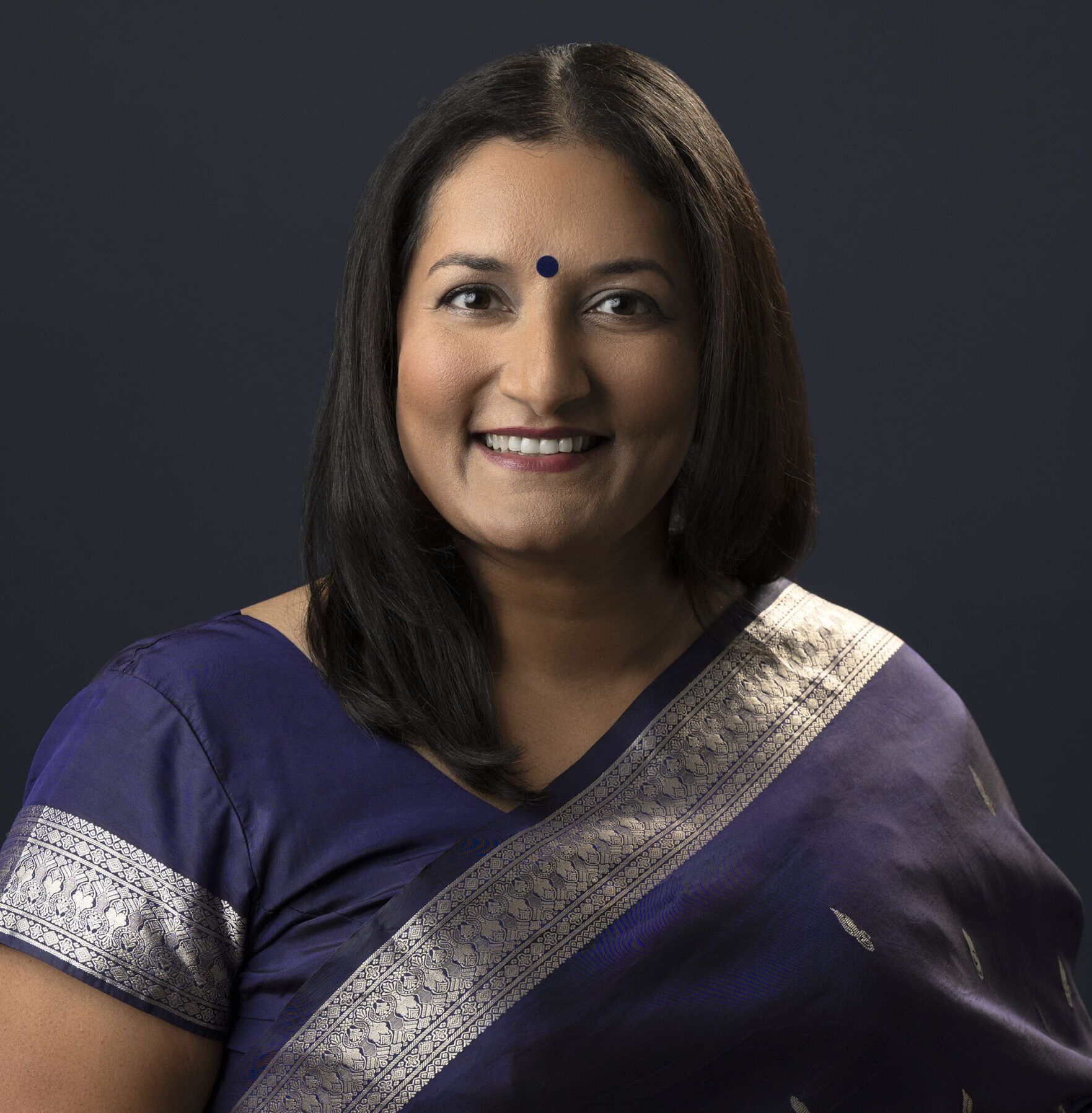 Primrose Watson headshot in Saree Primrose Watson headshot wearing saree